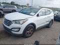 2014 Hyundai Santa Fe — photo 2 of 16 | VIN 5XYZU3LB1EG143194