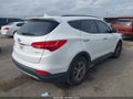 2014 Hyundai Santa Fe — photo 4 of 16 | VIN 5XYZU3LB1EG143194