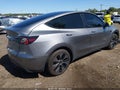 2025 Tesla Model Y — photo 4 of 15 | VIN 7SAYGDED8SF254550