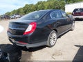 2015 Lincoln MKS — photo 4 of 16 | VIN 1LNHL9DK3FG601182