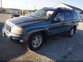 2004 Jeep Grand Cherokee — photo 2 of 12 | VIN 1J4GW48S94C259031