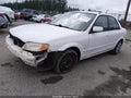 2002 Mazda Protege — photo 2 of 12 | VIN JM1BJ225X21580719