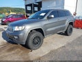 2012 Jeep Grand Cherokee — photo 2 of 17 | VIN 1C4RJEAGXCC116094