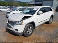 2012 Jeep Grand Cherokee — photo 2 of 17 | VIN 1C4RJFAG8CC185372