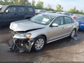 2013 Volkswagen Passat — photo 2 of 17 | VIN 1VWAP7A3XDC026480