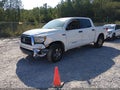 2012 Toyota Tundra — photo 2 of 17 | VIN 5TFEY5F13CX120611