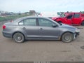2011 Volkswagen Jetta — photo 14 of 17 | VIN 3VWDX7AJ7BM384207