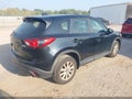 2014 Mazda CX-5 — photo 4 of 16 | VIN JM3KE4BEXE0375418