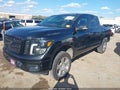 2019 Nissan Titan — photo 2 of 16 | VIN 1N6AA1E50KN519337