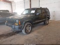2001 Jeep Cherokee — photo 2 of 12 | VIN 1J4FF48S01L560066