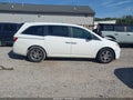 2012 Honda Odyssey — photo 13 of 16 | VIN 5FNRL5H69CB140414