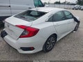 2018 Honda Civic — photo 4 of 16 | VIN 2HGFC2F83JH572706