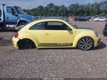 2014 Volkswagen Beetle — photo 13 of 16 | VIN 3VWVT7ATXEM624002