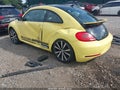2014 Volkswagen Beetle — photo 3 of 16 | VIN 3VWVT7ATXEM624002