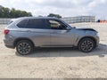 2016 BMW X5 — photo 13 of 16 | VIN 5UXKR0C57G0U12771