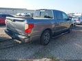 2017 Nissan Titan — photo 4 of 18 | VIN 1N6AA1E63HN564273