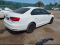 2015 Volkswagen Jetta — photo 4 of 12 | VIN 3VWD17AJ3FM302352