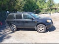 2007 Honda Pilot — photo 13 of 16 | VIN 5FNYF28467B046321