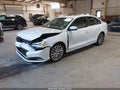 2015 Volkswagen Jetta — photo 2 of 16 | VIN 3VWD17AJ6FM275857