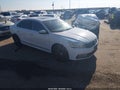 2017 Volkswagen Passat — photo 1 of 17 | VIN 1VWBT7A37HC052461