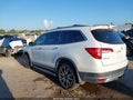 2022 Honda Pilot — photo 13 of 16 | VIN 5FNYF6H63NB002136