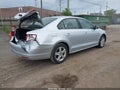 2014 Volkswagen Jetta — photo 4 of 16 | VIN 3VWLL7AJ2EM296239