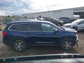 2018 Honda Pilot — photo 14 of 17 | VIN 5FNYF6H6XJB007666