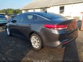2018 Kia Optima — photo 3 of 16 | VIN 5XXGU4L38JG218381