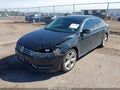 2015 Volkswagen Passat — photo 2 of 11 | VIN 1VWBV7A33FC014295