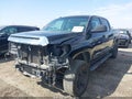 2014 Toyota Tundra — photo 2 of 20 | VIN 5TFEM5F11EX075294