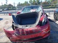 2024 Tesla Model Y — photo 11 of 15 | VIN 7SAYGDEE0RA269480