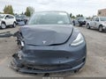 2022 Tesla Model Y — photo 11 of 15 | VIN 7SAYGDEE5NF341559