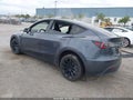 2022 Tesla Model Y — photo 3 of 15 | VIN 7SAYGDEE5NF341559