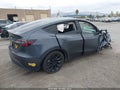 2022 Tesla Model Y — photo 4 of 15 | VIN 7SAYGDEE5NF341559