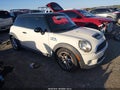2009 Mini Cooper — photo 1 of 17 | VIN WMWMF73549TW86987