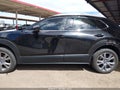2024 Mazda CX-30 — photo 15 of 17 | VIN 3MVDMBDMXRM632091