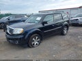 2014 Honda Pilot — photo 2 of 16 | VIN 5FNYF4H9XEB023113