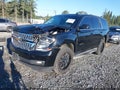 2015 Chevrolet Tahoe — photo 2 of 18 | VIN 1GNSKBKC2FR601024