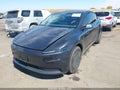 2026 Tesla Model Y — photo 2 of 14 | VIN 7SAYGDEDXTA606610