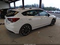 2021 Subaru Impreza — photo 4 of 17 | VIN 4S3GTAU63M3700853