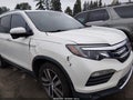 2016 Honda Pilot — photo 17 of 18 | VIN 5FNYF5H98GB034622