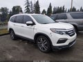 2016 Honda Pilot — photo 1 of 18 | VIN 5FNYF5H98GB034622