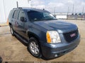 2010 GMC Yukon — photo 1 of 16 | VIN 1GKMCAE3XAR223407