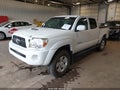 2011 Toyota Tacoma — photo 2 of 16 | VIN 3TMLU4EN7BM072617