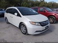 2014 Honda Odyssey — photo 1 of 16 | VIN 5FNRL5H61EB033733