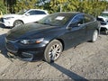 2017 Chevrolet Malibu — photo 2 of 16 | VIN 1G1ZE5ST5HF207627