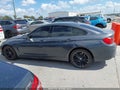 2016 BMW 4 Series — photo 14 of 17 | VIN WBA4C9C59GG138302