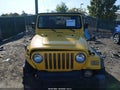2002 Jeep Wrangler — photo 11 of 15 | VIN 1J4FA49S42P742148