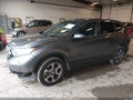 2018 Honda CR-V — photo 2 of 16 | VIN 7FARW2H5XJE056391