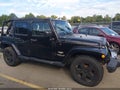 2008 Jeep Wrangler Unlimited — photo 13 of 16 | VIN 1J4GA59168L600823